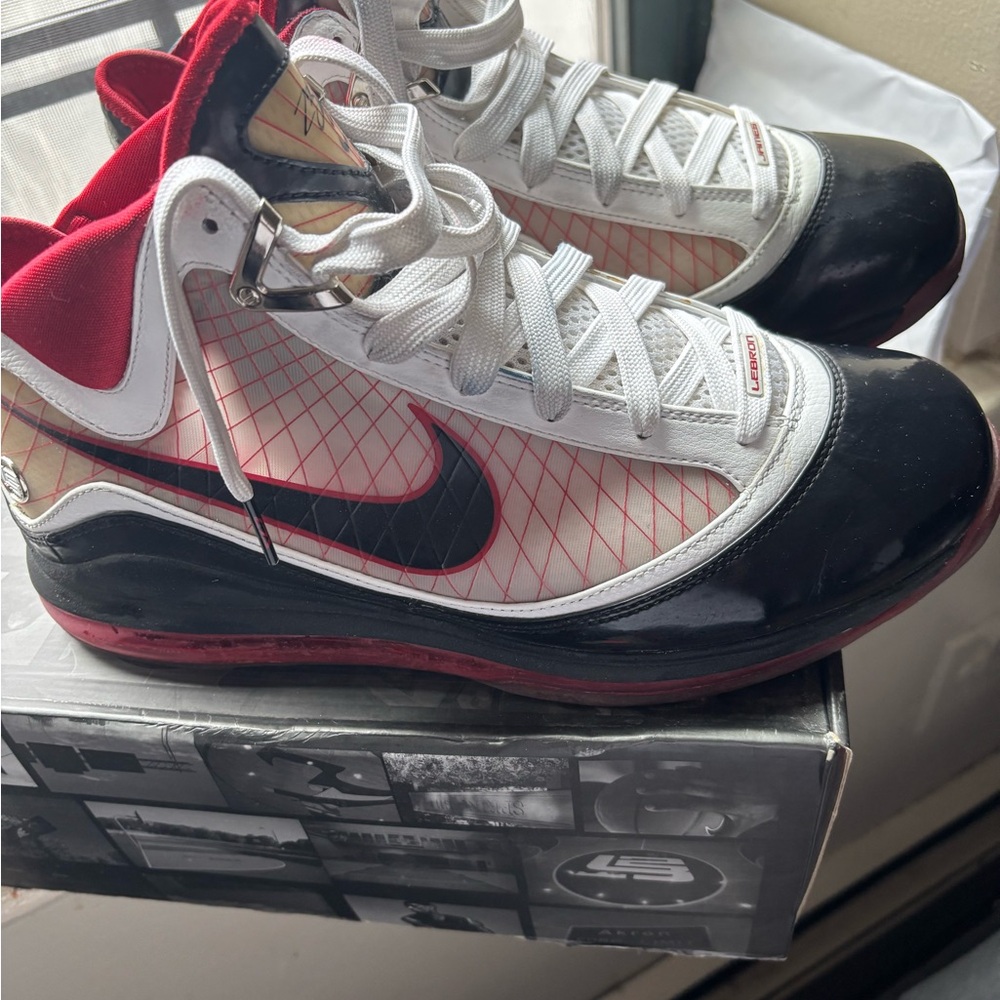 LeBron‘s Nike White & Black High-Top Sneakers